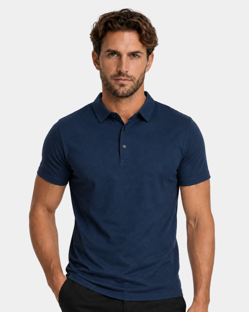 Man wearing a navy blue polo shirt against a plain background #Color_blue
