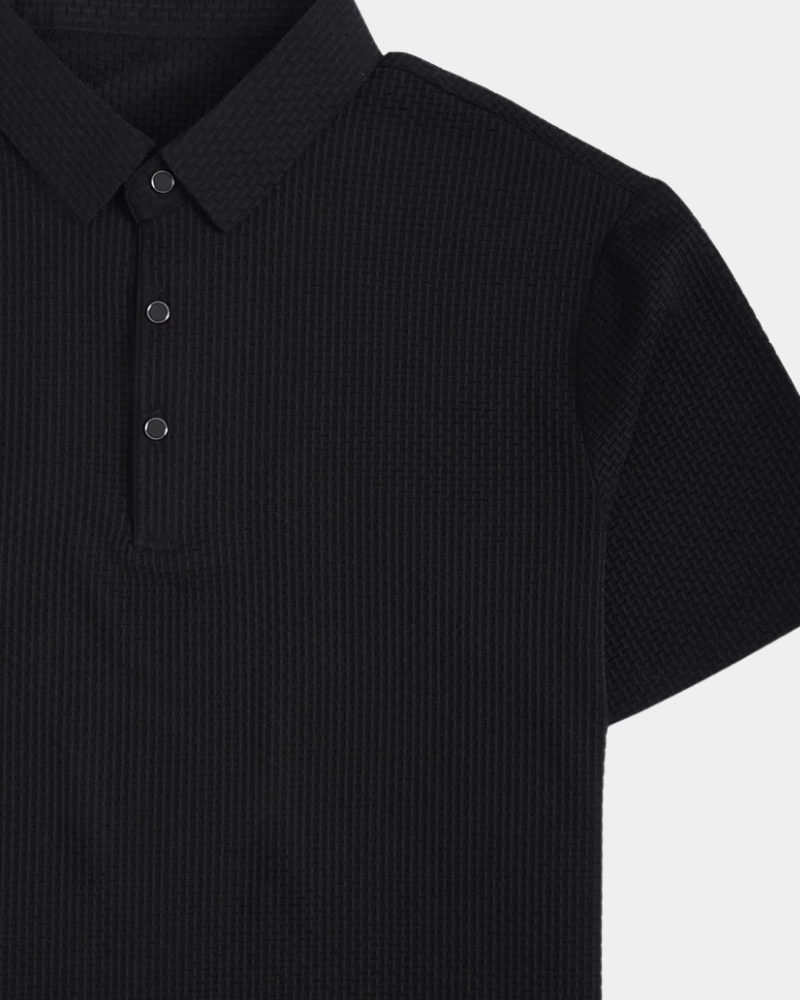 Black textured polo shirt on a white background #Color_black