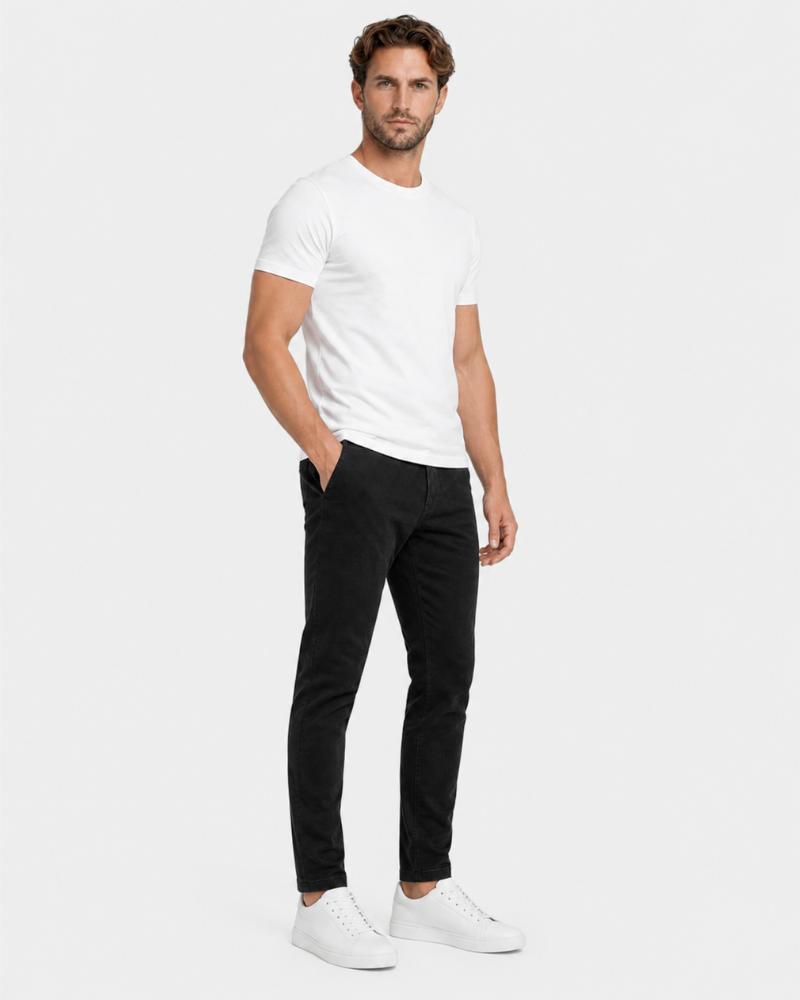 Man wearing a white t-shirt and black pants on a white background #Color_black