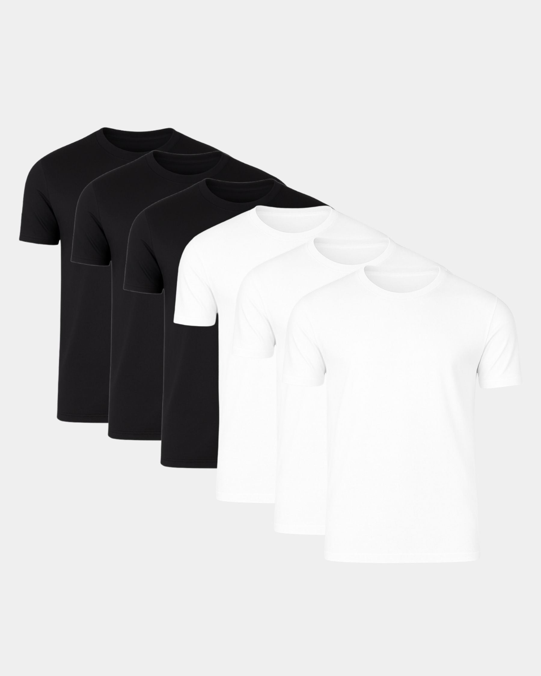 A pack of five short-sleeve crew-neck t-shirts in black and white, arranged in a staggered fan layout on a light gray background.