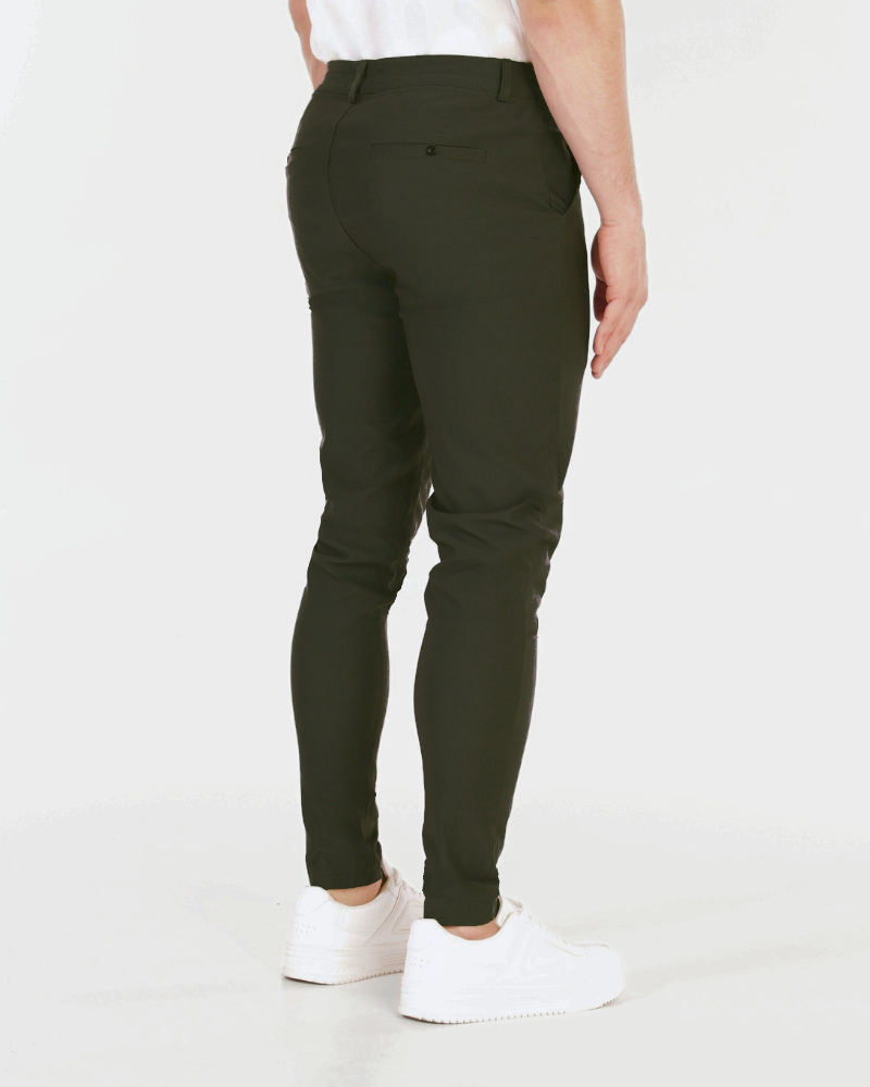 Rear view of By Alden luxury olive chinos in breathable stretch material featuring a minimalist clean-lined pocket design. #color_olive green