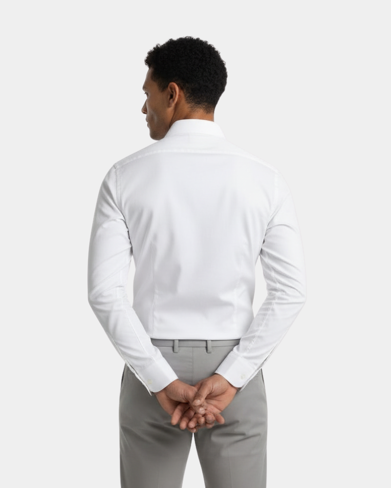 Minimalist white luxury shirt back view. Tailored slim fit silhouette in technical performance stretch fabric.