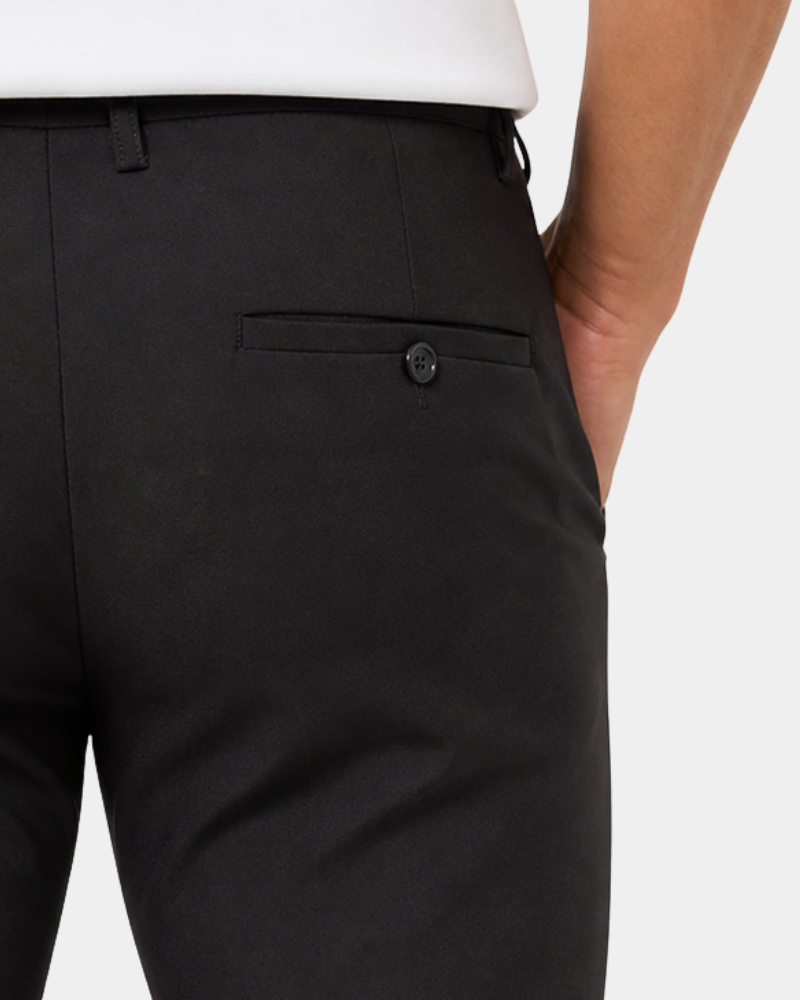 By Alden Black pants worn by a person on a white background #Color_black