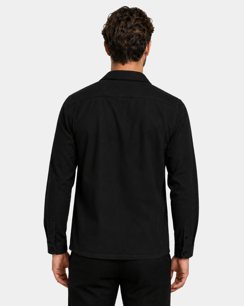 Man wearing a By Alden black long-sleeve shirt on a white background #color_black