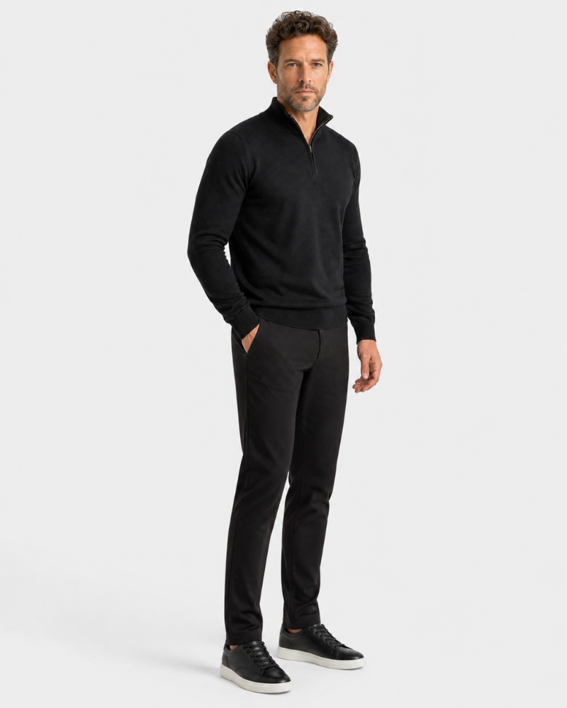Man wearing a By Alden black sweater and pants on a white background #color_black