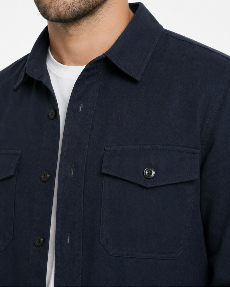 By Alden Navy blue shirt with a pocket and buttons on a plain background #color_navy