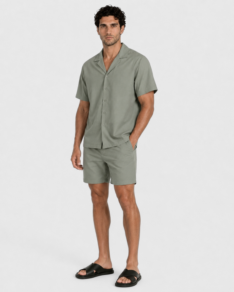By Alden Olive Green Linen Shorts worn by a male model, full front view styled as matching set, light grey background #Color_olive green