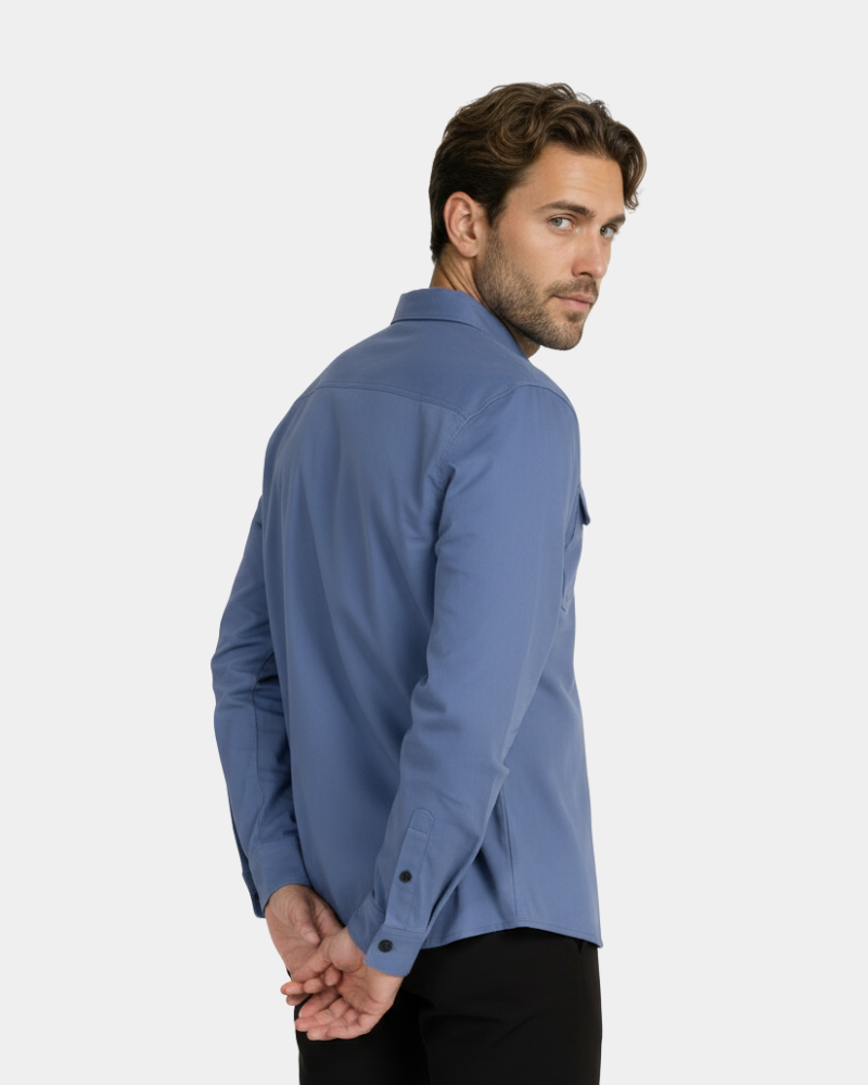 By Alden Steel Blue Overshirt worn by a White male model, cropped back angle view, light grey background #Color_lake blue