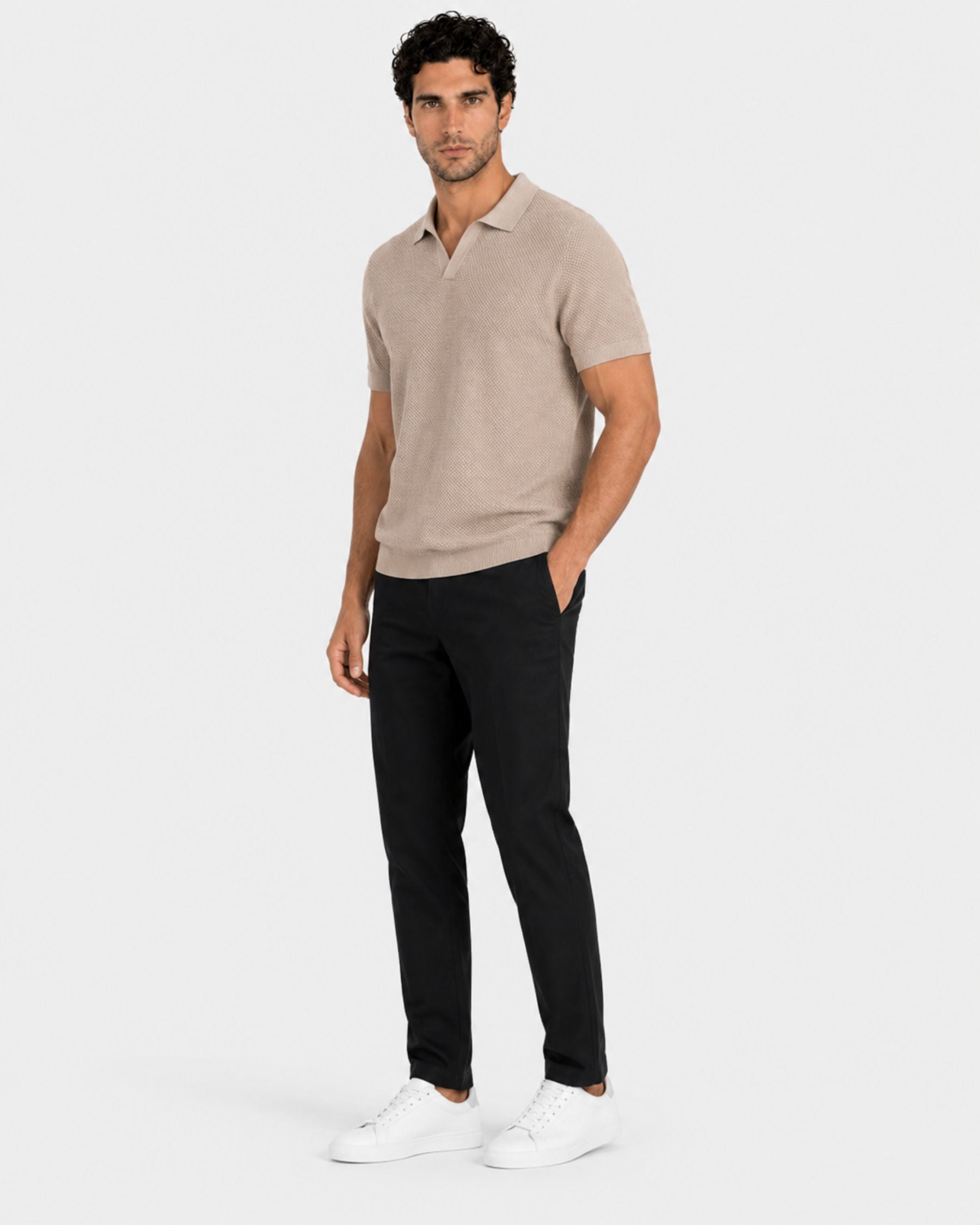 By Alden Stone open-collar knit polo shirt on male model, three-quarter view, full body, light gray background. #color_stone