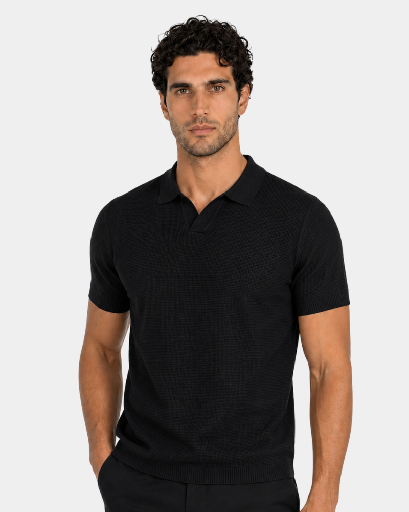 By Alden black open-collar knit polo shirt on male model, front view, upper body, light gray background. #color_black