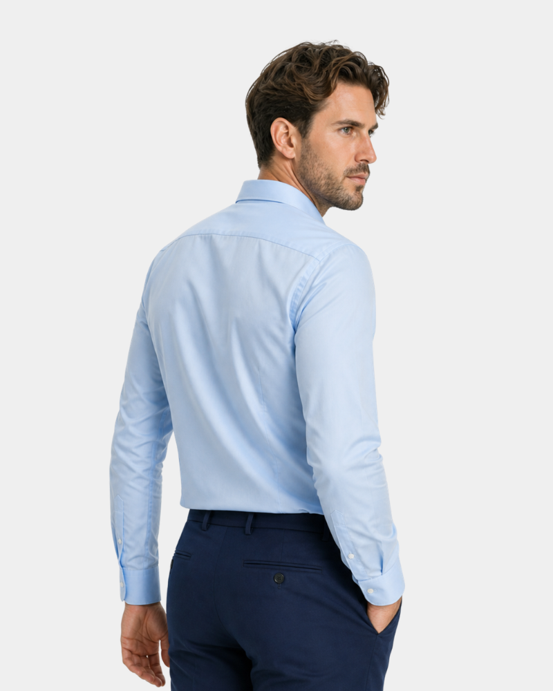 By Alden light blue slim-fit dress shirt on male model, back view, upper body, light gray background. #color_light blue