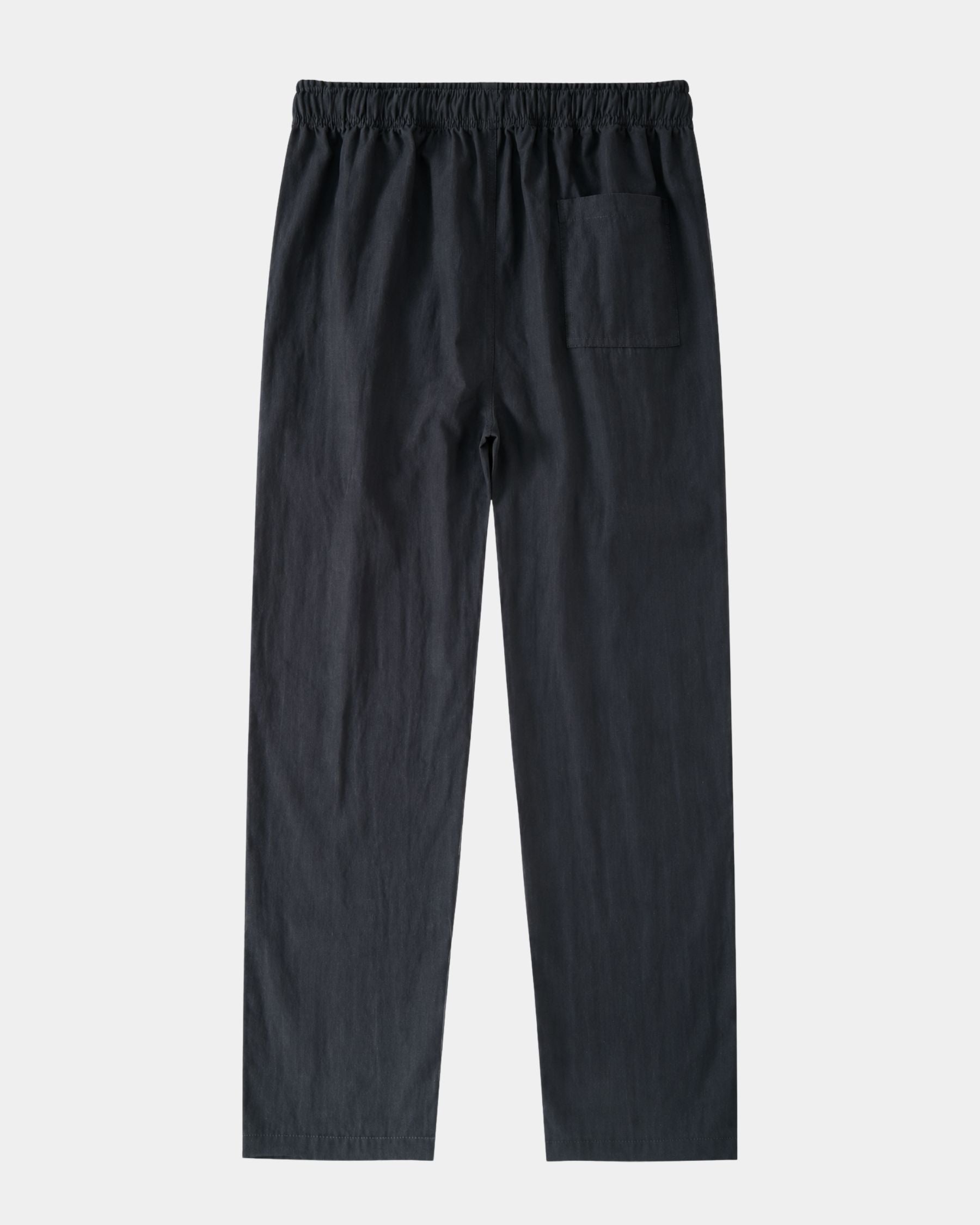 By Alden navy linen drawstring trousers, flat lay back view with back pocket detail, light gray background #color_navy