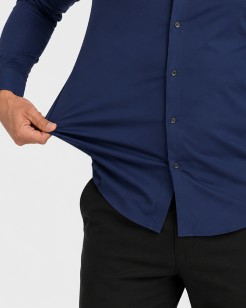 By Alden navy stretch dress shirt fabric detail, male model pulling fabric, front close-up, light gray background. #color_navy