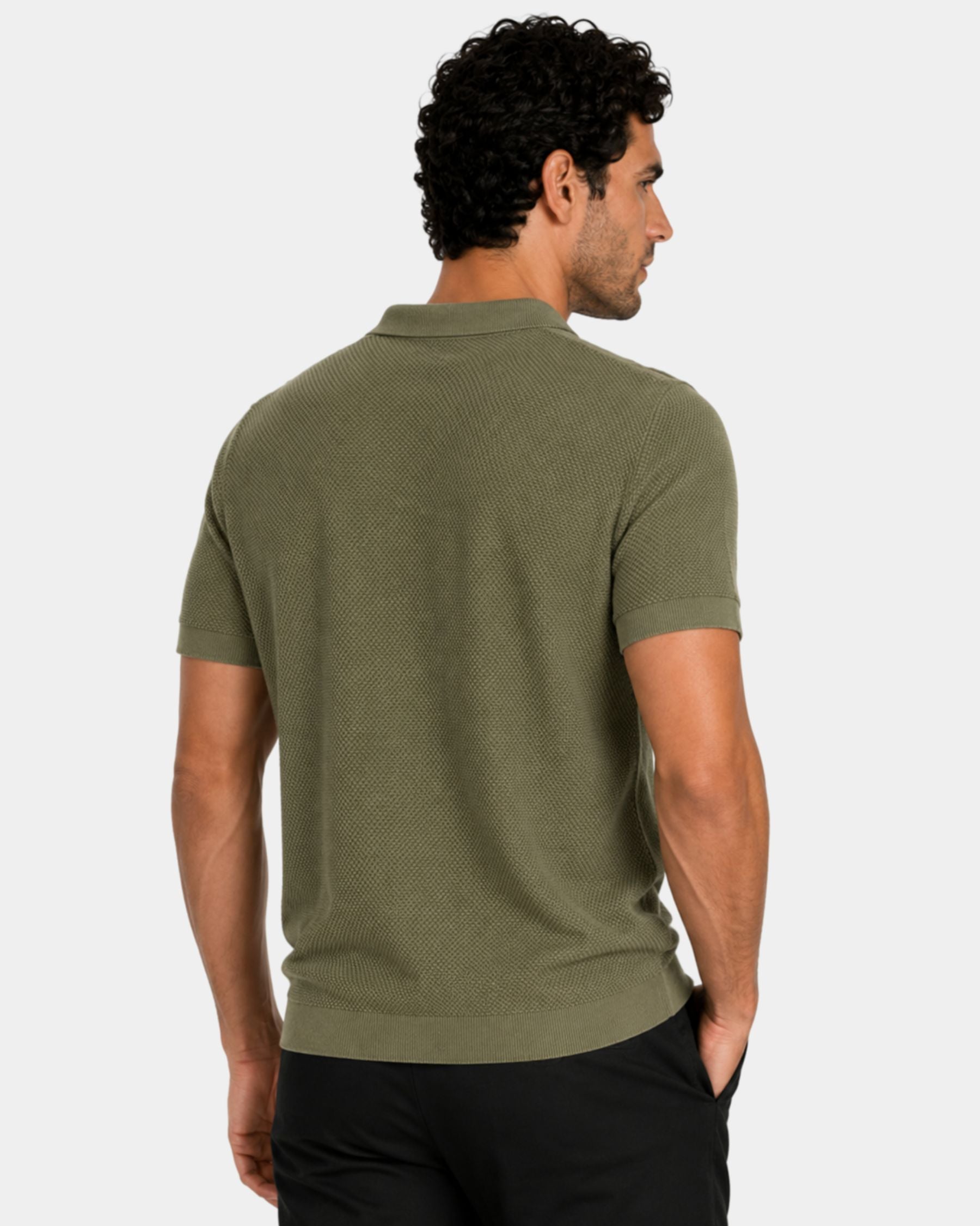 By Alden olive green knit polo shirt on male model, back view upper body, light gray background #Color_olive green