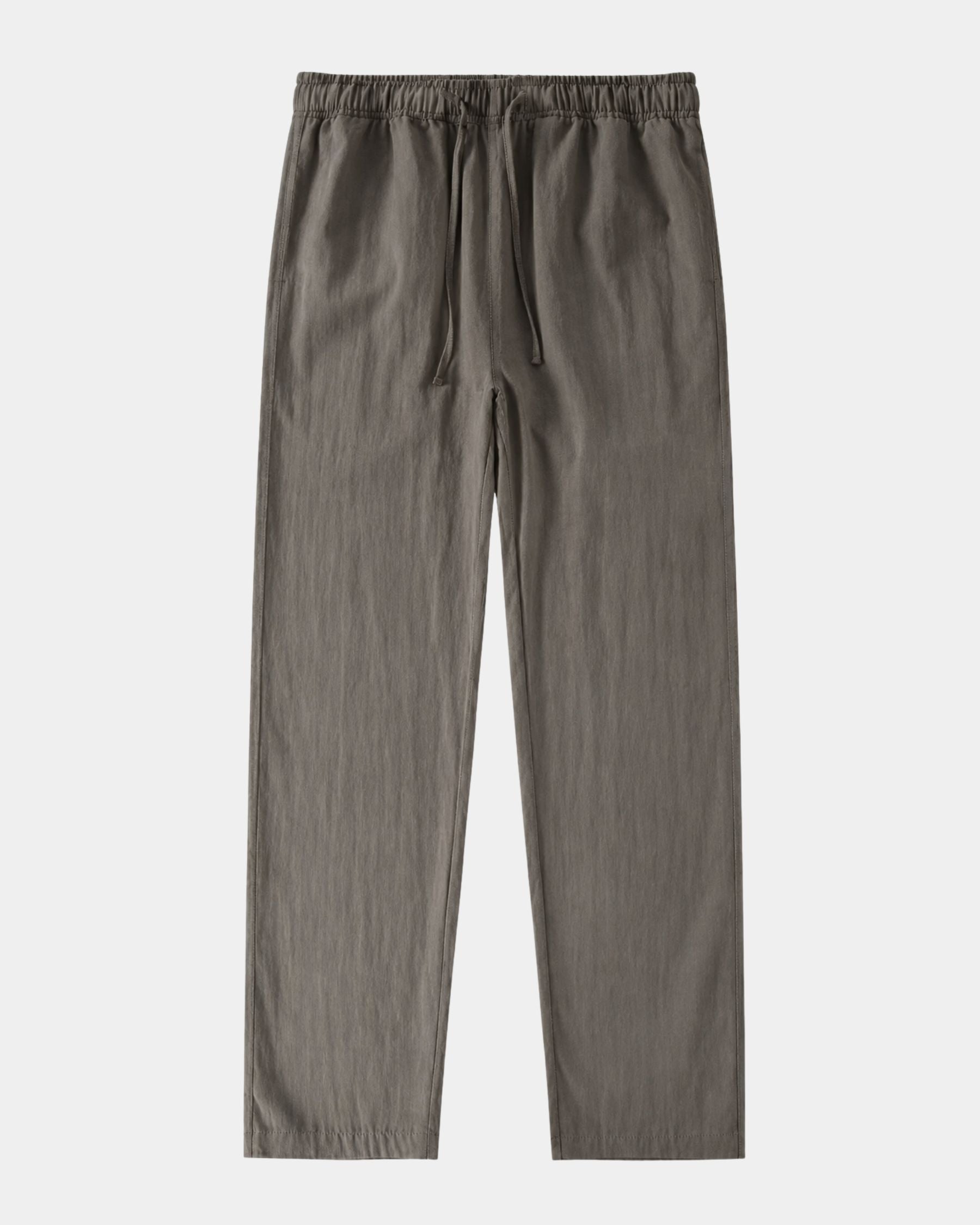 By Alden olive green linen drawstring trousers, flat lay front view, light gray background #color_olive green