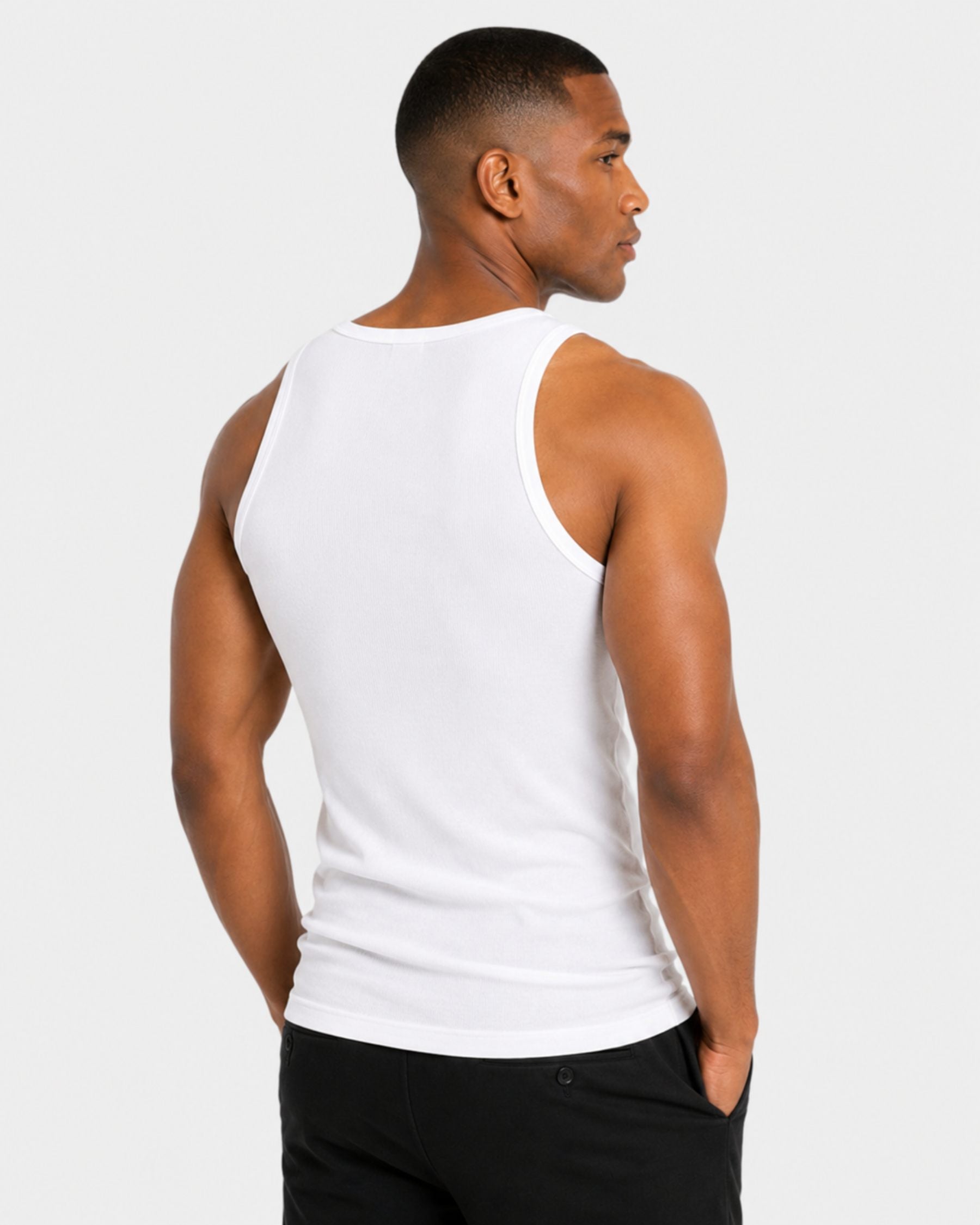 By Alden white ribbed tank top on male model, back view upper body, light gray background #Color_white
