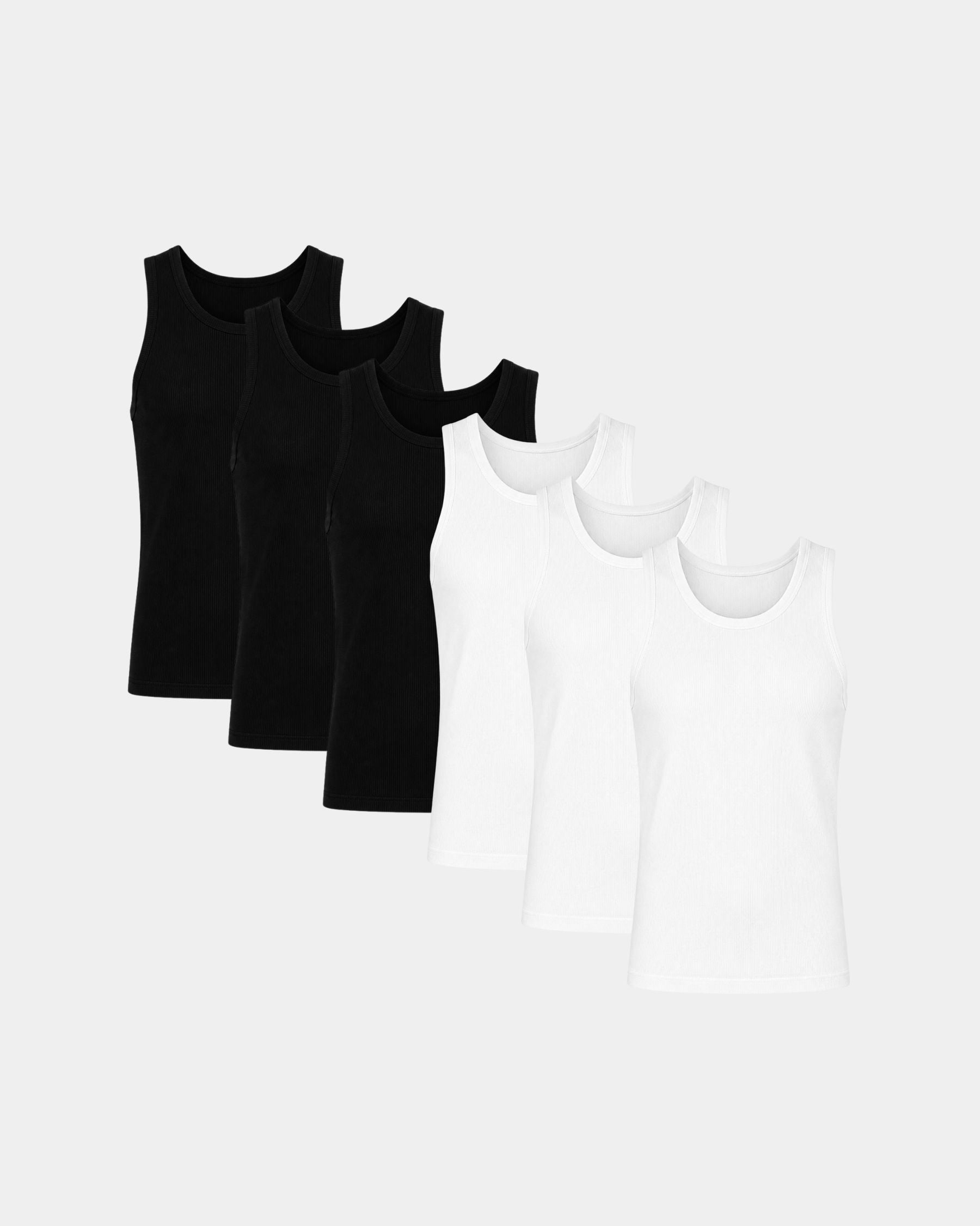 Five sleeveless tank tops arranged in a fan shape on a light gray background, with three black tanks in the back and two white tanks in the front.