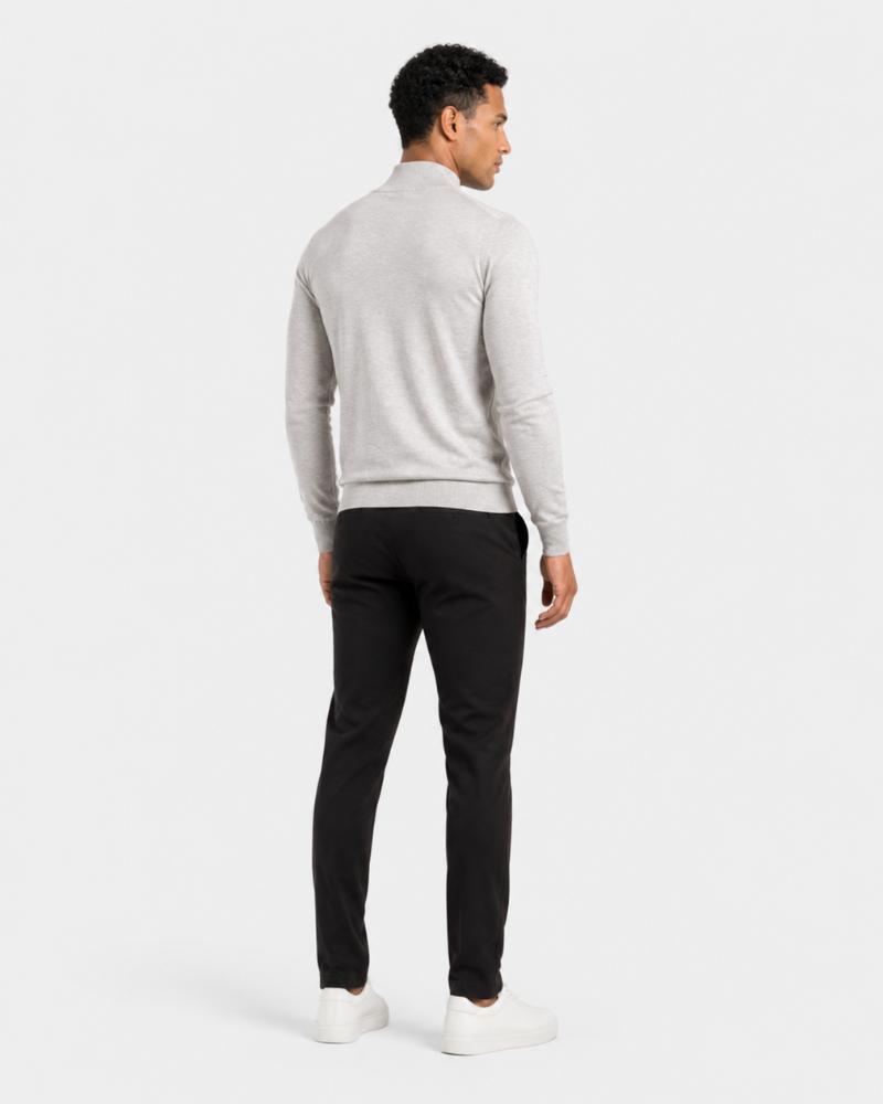 Man wearing a By Alden gray sweater and black pants on a white background #color_gray