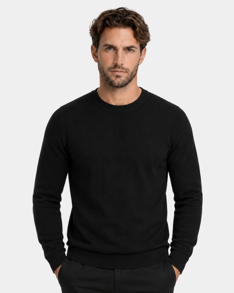 Man wearing a By Alden black sweater on a light gray background #Color_black
