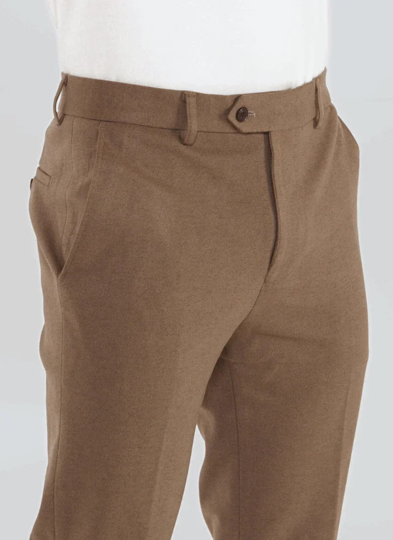 Close-up of brown wool blend classic trousers with button closure and belt loops