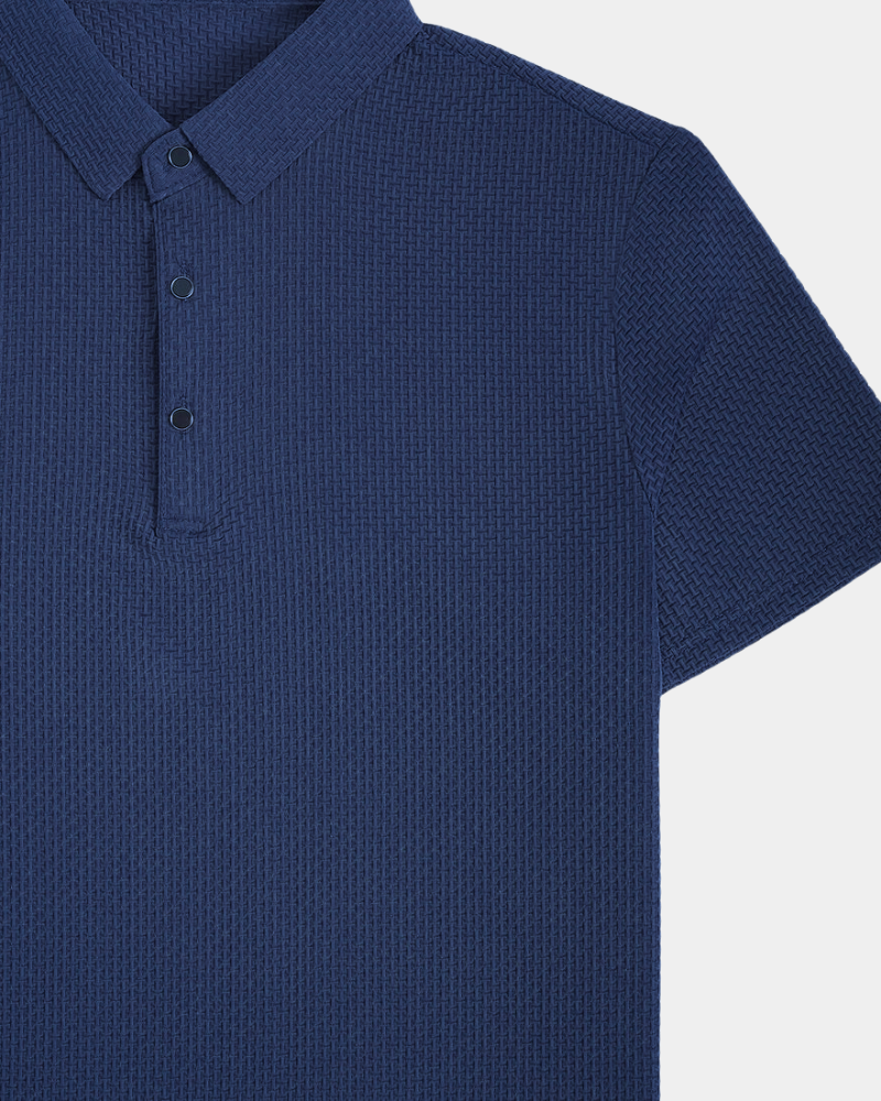 Navy blue textured polo shirt on a light gray background #Color_blue