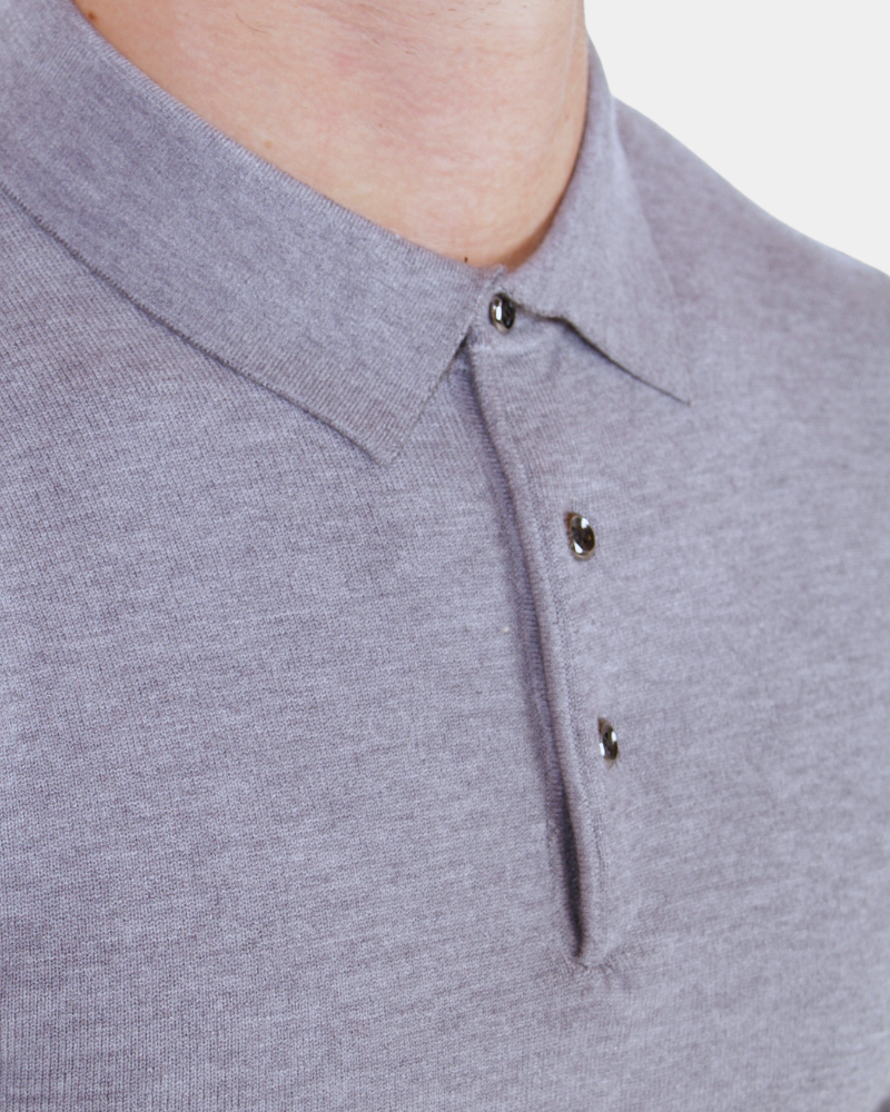 Close-up of By Alden luxury grey merino wool knit. Minimalist heathered texture with a sharp collar and polished button detail. #color_gray