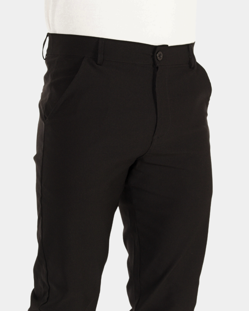 By Alden Close-up of luxury black stretch cotton fabric, highlighting the minimalist waistband and premium texture. #color_black