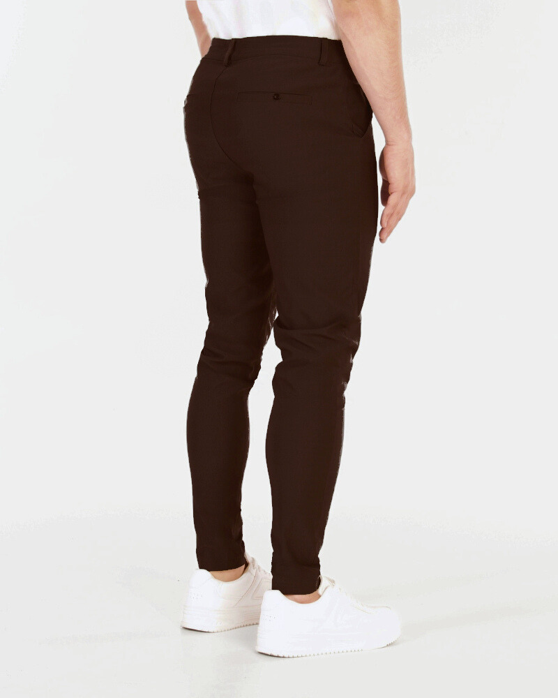 By Alden Minimalist luxury chocolate brown chinos in a slim-fit stretch cotton blend, featuring a tailored, lightweight texture. #color_dark brown
