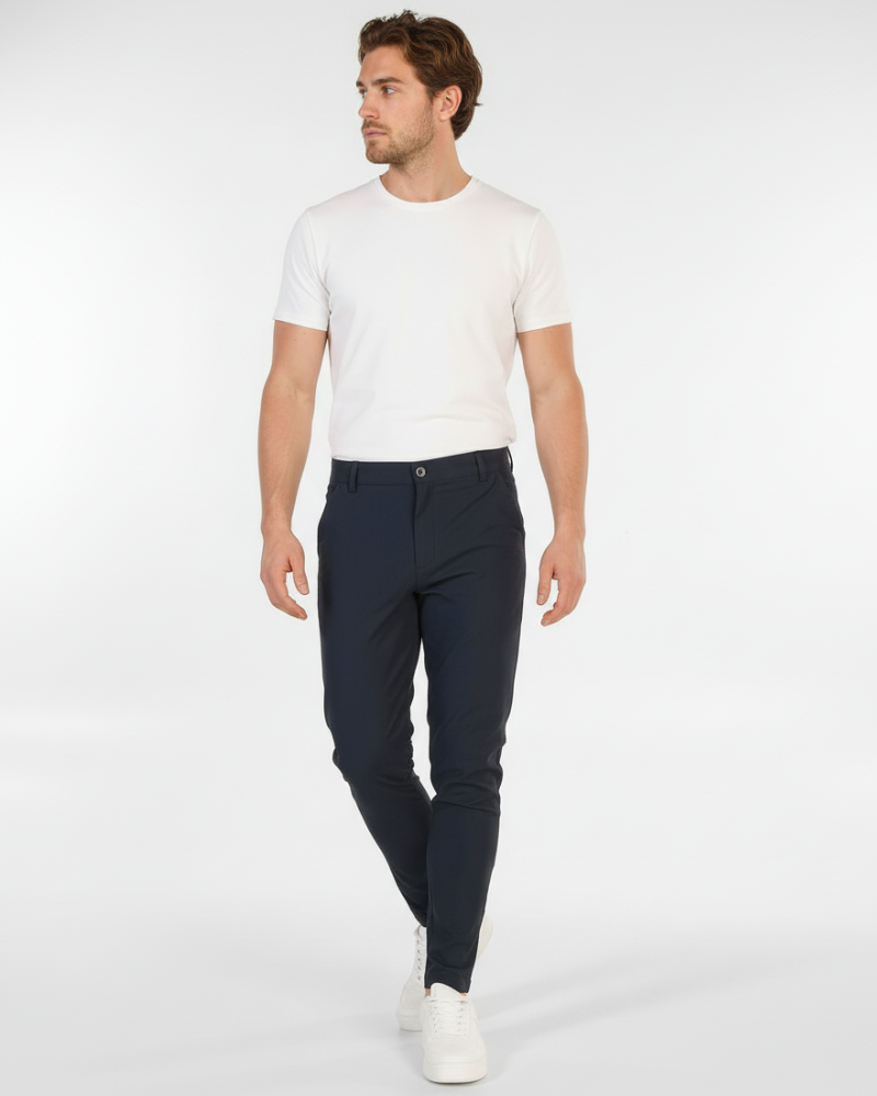By Alden Minimalist luxury navy chinos in a slim-fit stretch cotton twill, styled for a modern professional look. #color_navy