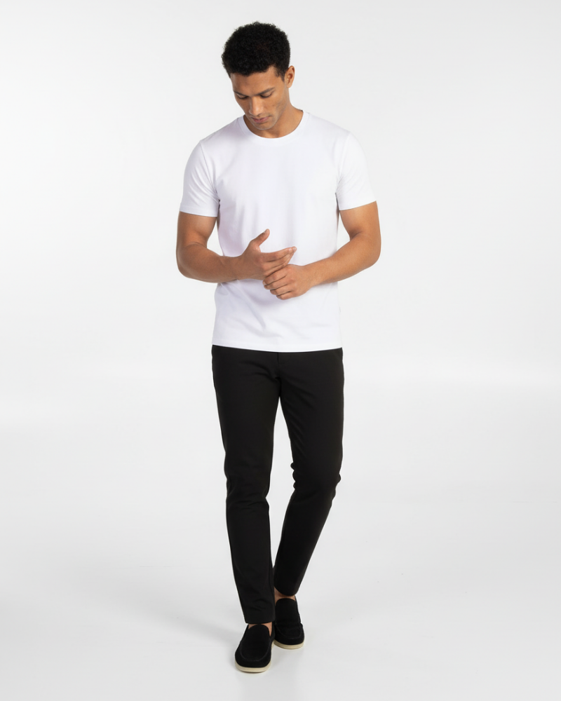 Model wearing a luxury white Smart Fit T-shirt, offering a clean, minimalist professional silhouette.