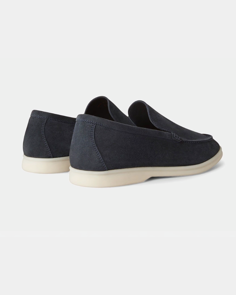 Minimalist By Alden navy suede loafers showing the heel and cream rubber sole for a luxury, comfortable slip-on fit #color_navy