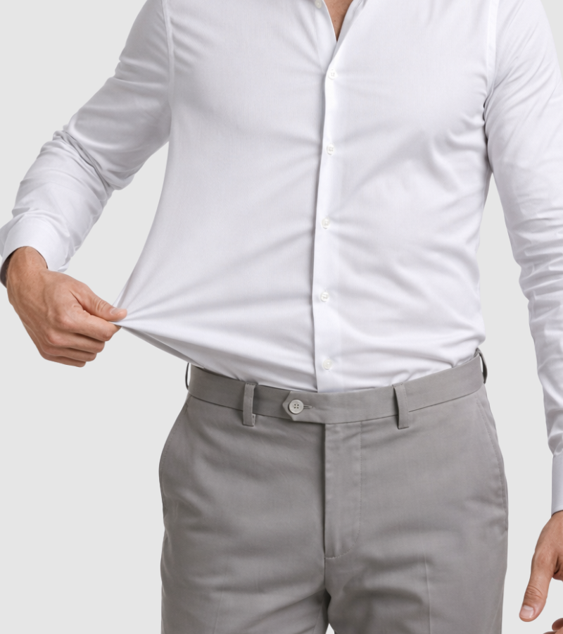 White dress shirt and gray pants on a plain background