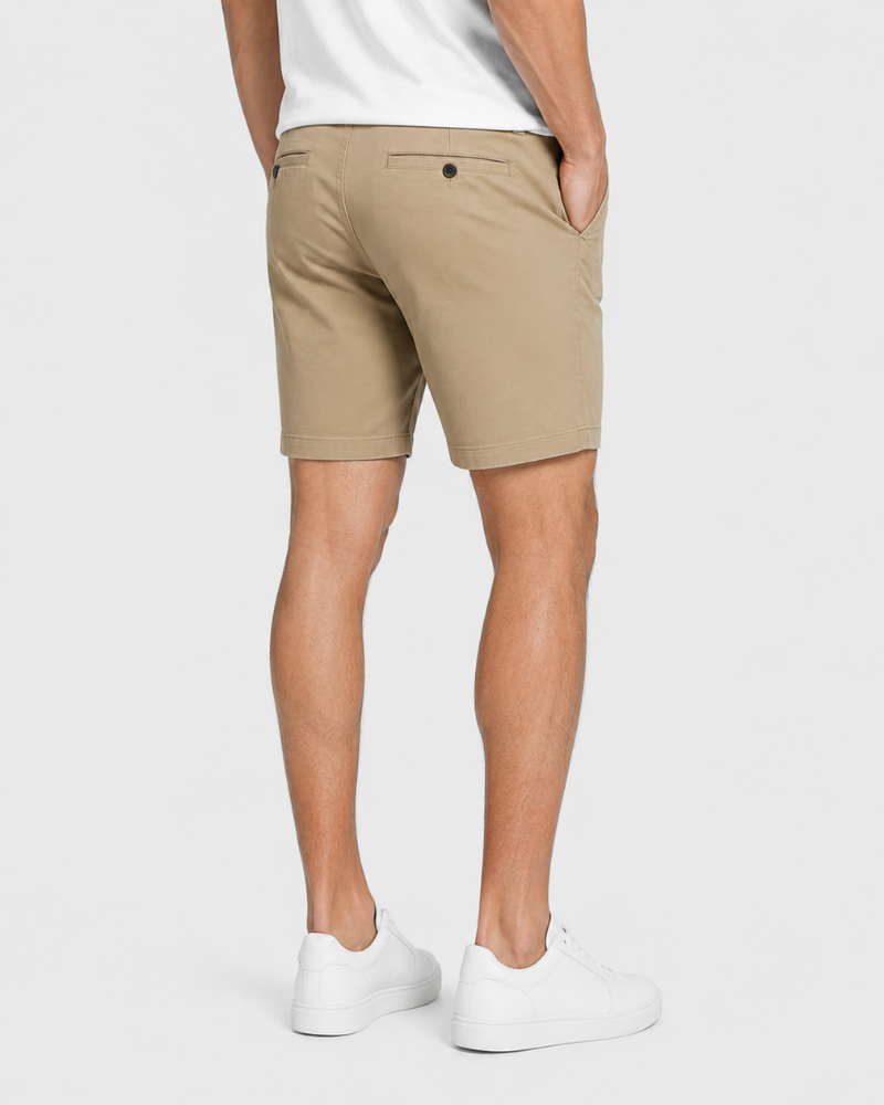 By Alden Beige Shorts on male model back view full body light gray background #color_beige