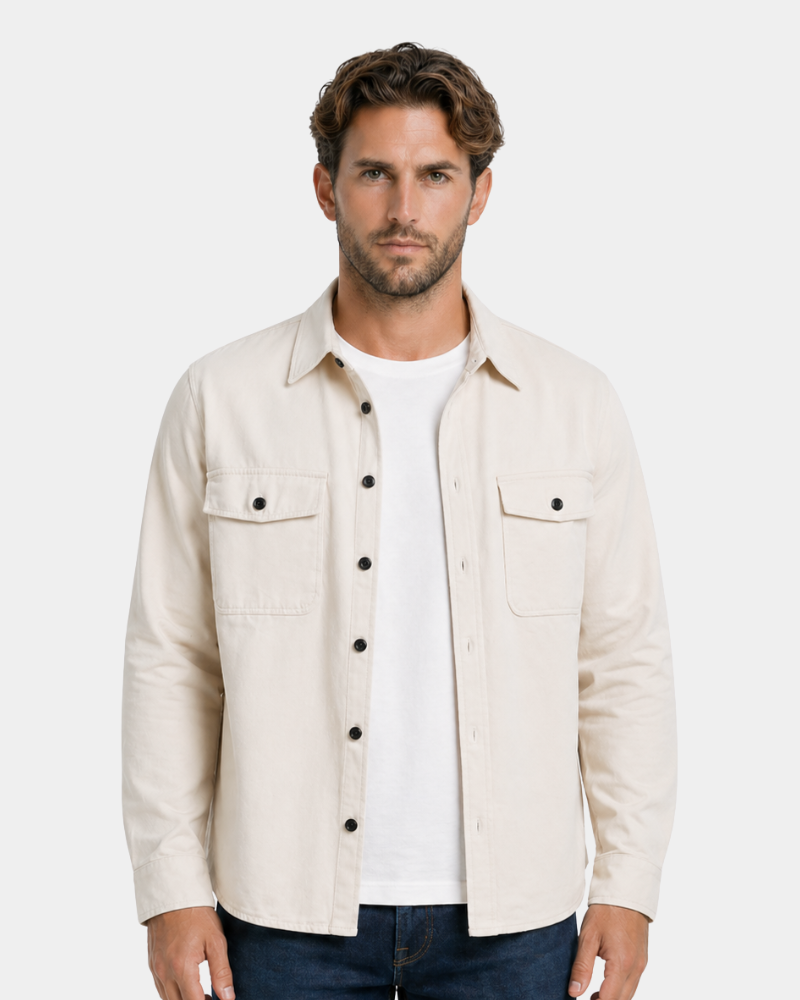 Man wearing a By Alden beige jacket over a white shirt on a light gray background #color_deep stone