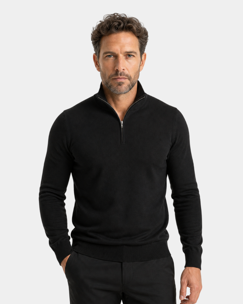 Man wearing a By Alden black quarter-zip sweater on a light gray background #color_black