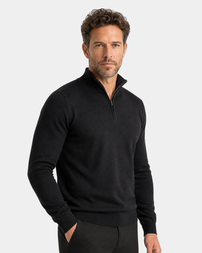 Man wearing a By Alden black quarter-zip sweatshirt on a light gray background #color_black