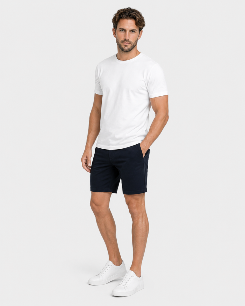 By Alden Navy Shorts on male model front angle full body view light gray background #color_navy