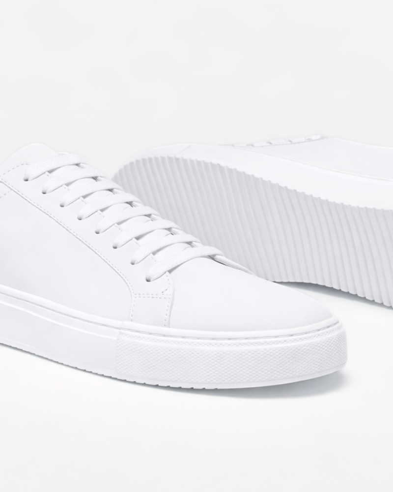 By Alden White Leather Classic Trainers, close-up angled view of toe and sole detail, white background #color_white