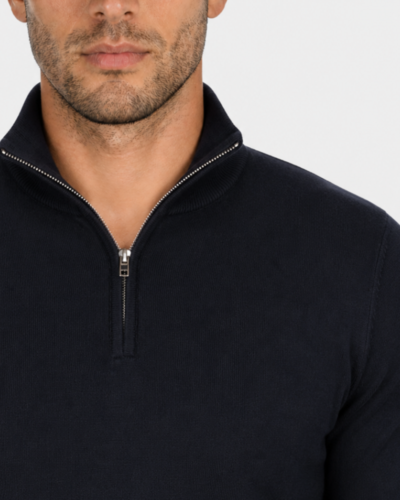 By Alden black half-zip knit sweater zipper detail, male model, front close-up, light gray background. #Color_black