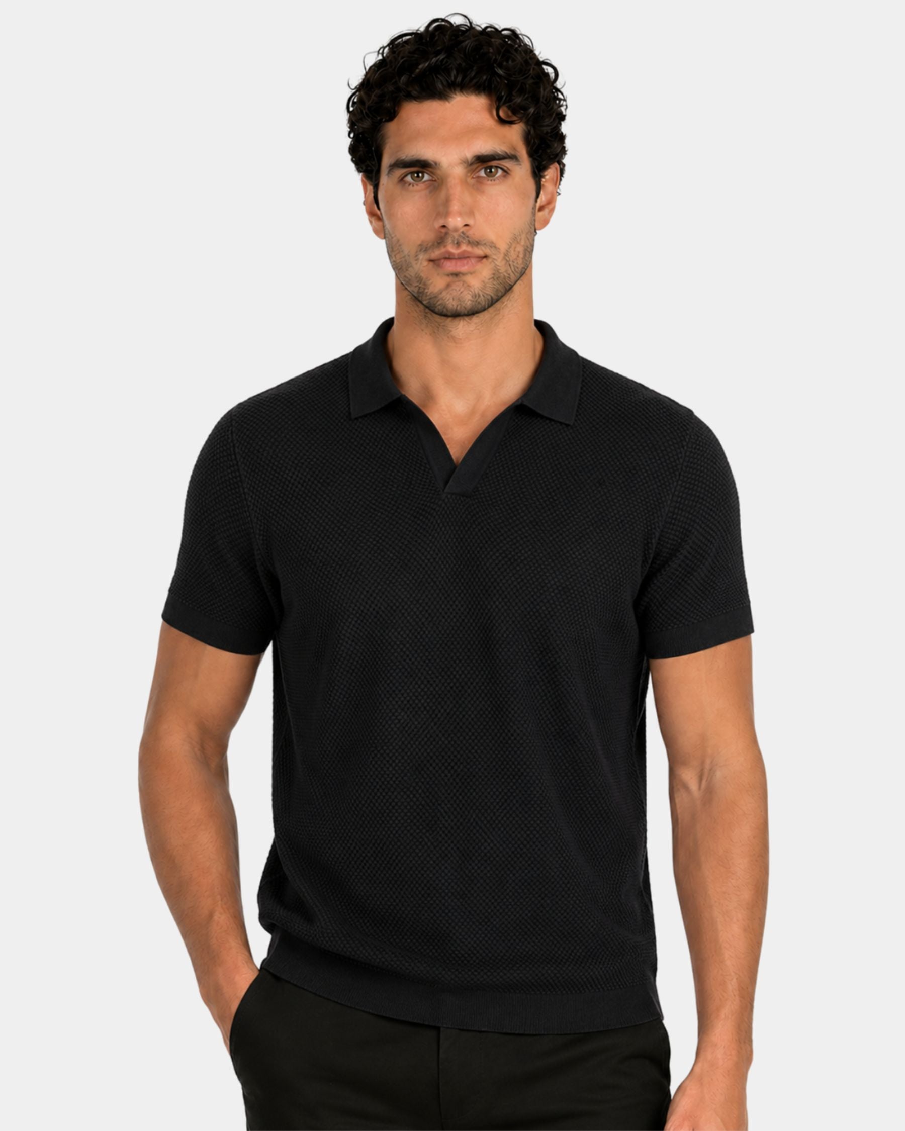 By Alden black open-collar knit polo shirt on male model, front view, upper body, light gray background. #Color_black