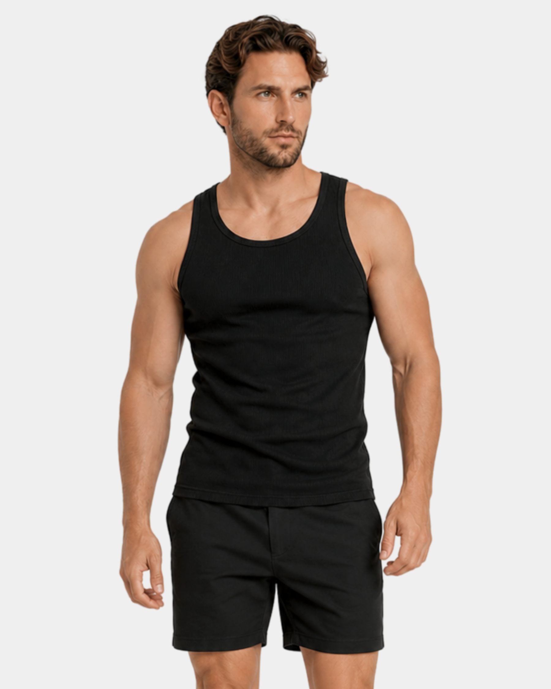 By Alden black ribbed tank top on male model, three-quarter view full body, light gray background #Color_black