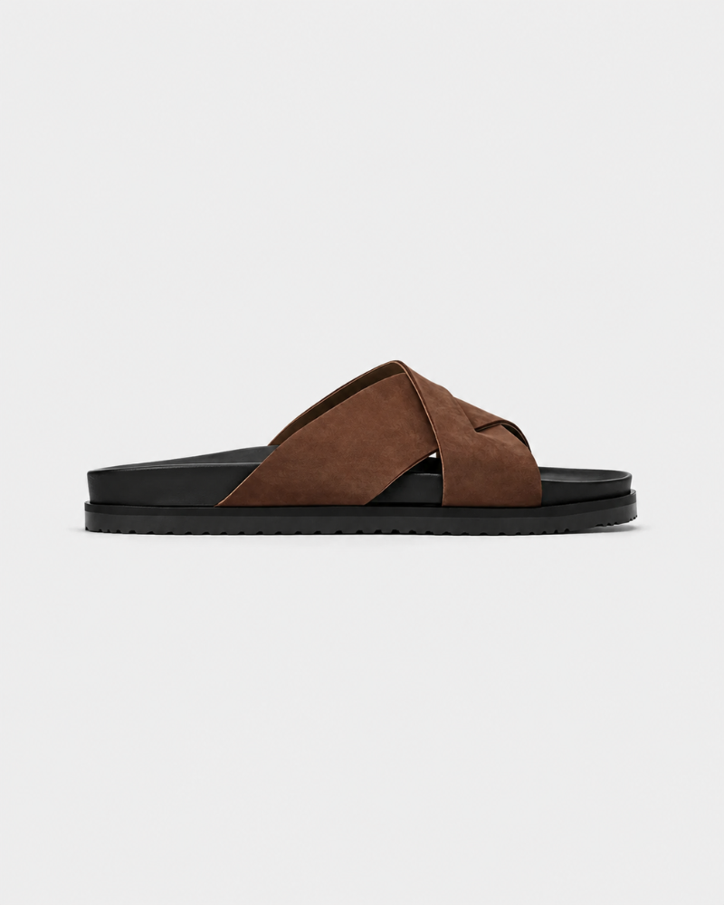 By Alden brown cross-strap suede slide sandal, black sole, side view, gray background #Color_brown