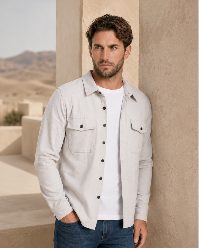 By Alden light gray overshirt on male model, three-quarter view, upper body, outdoor desert beige background. #Color_light gray