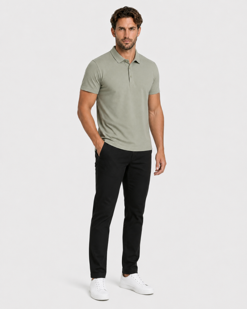 By Alden sage green knit polo shirt on male model, three-quarter view, full body, light gray background. #color_olive green
