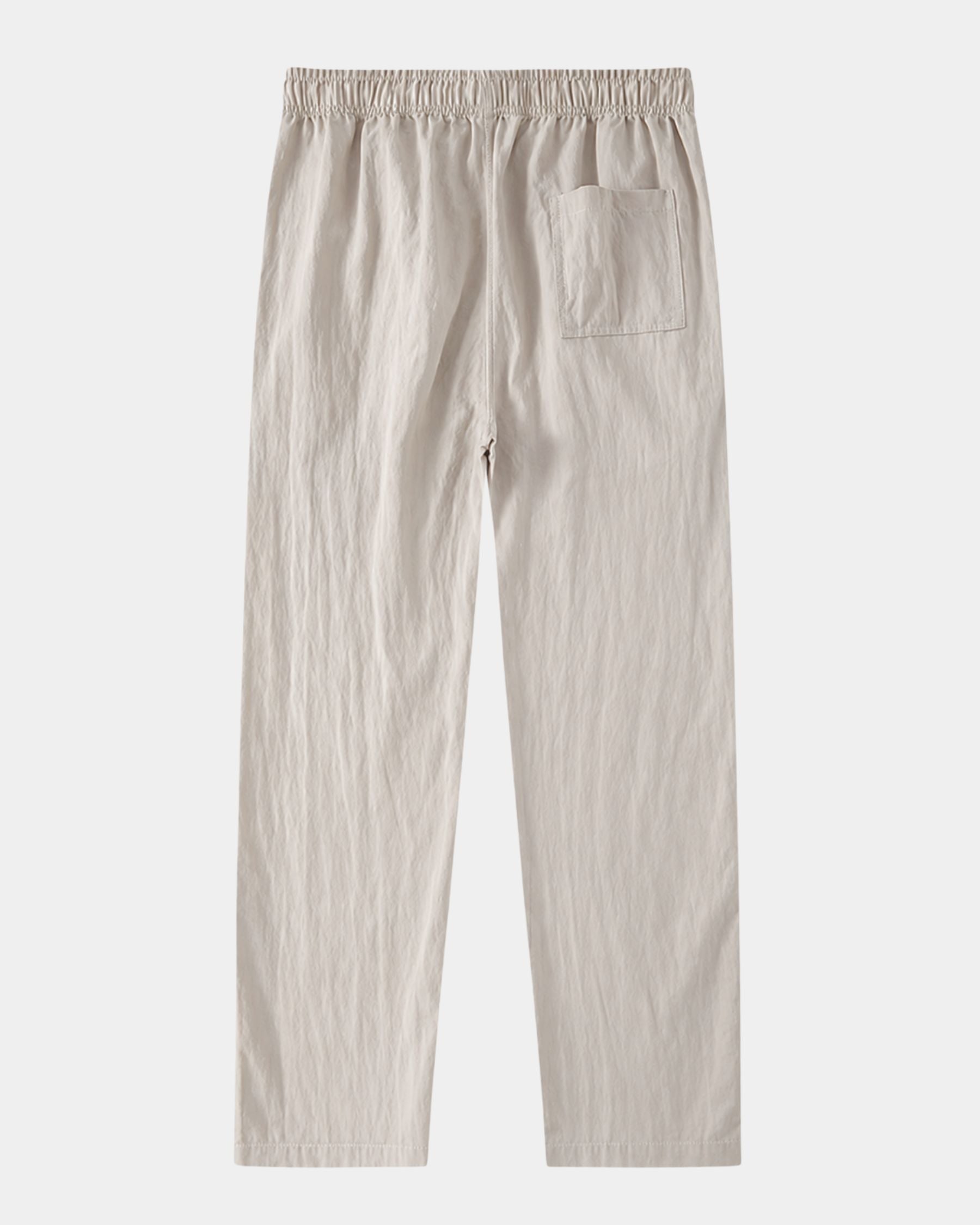 By Alden stone linen drawstring trousers, flat lay back view with back pocket detail, light gray background #color_stone