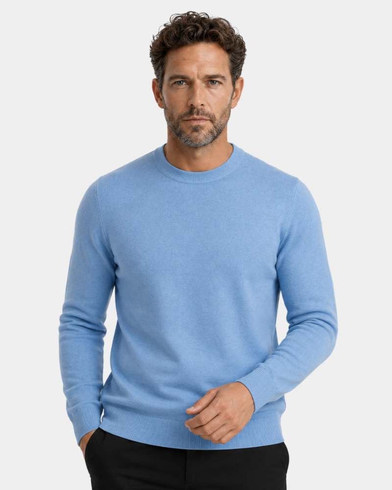 Man wearing a By Alden light blue sweater on a plain background #Color_light blue