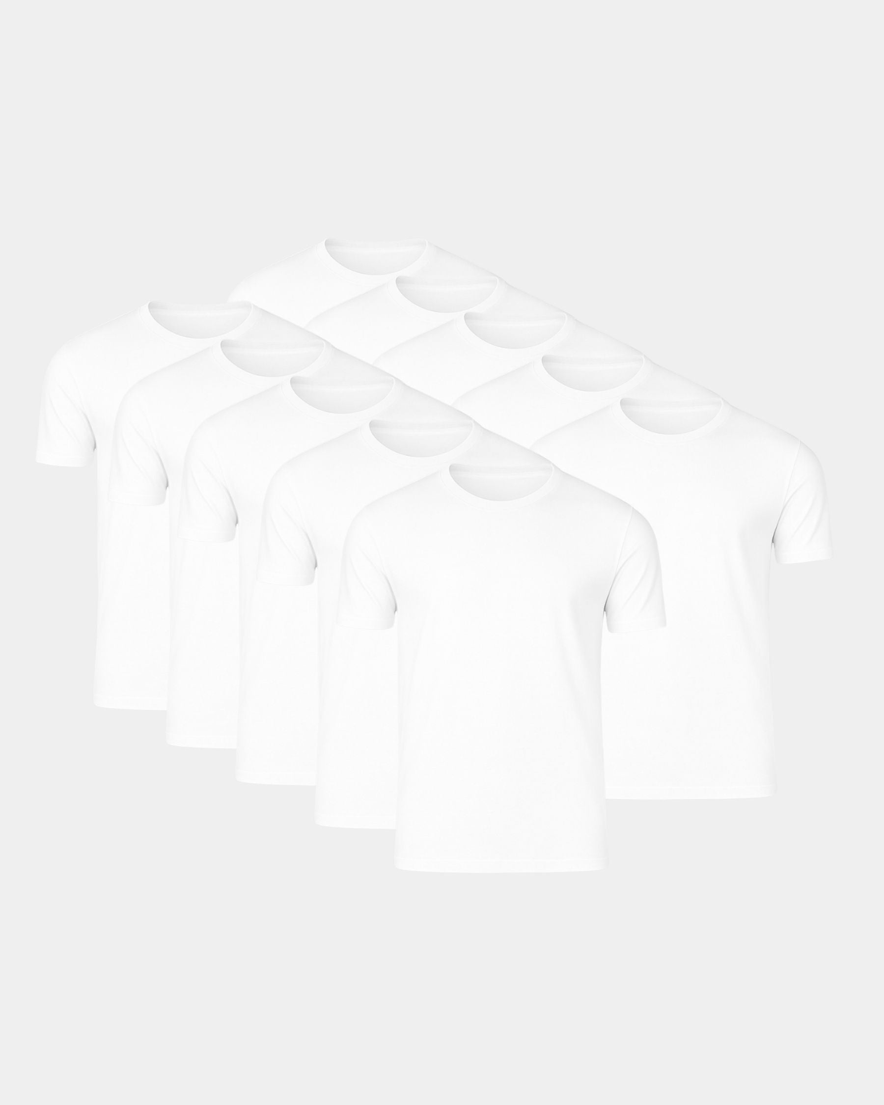 Six plain white short-sleeve crew-neck T-shirts arranged in a staggered fan shape on a light gray background.